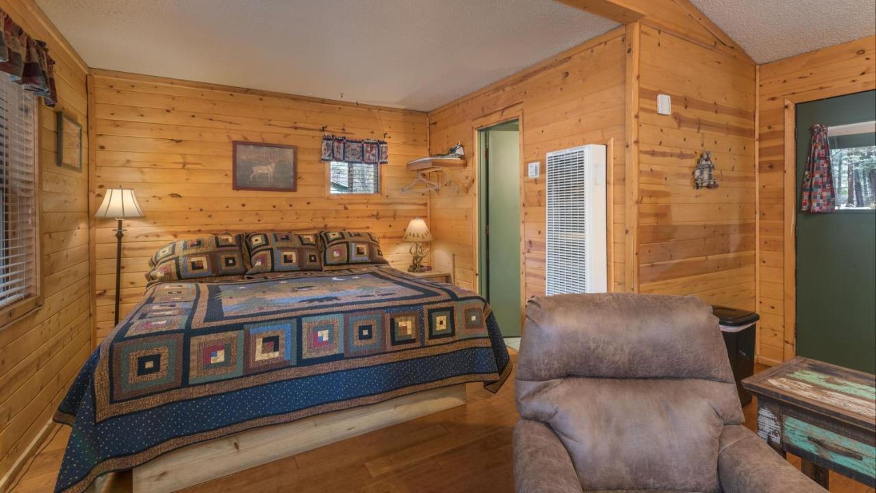 Whispering Pine Cabins Руидозо Экстерьер фото